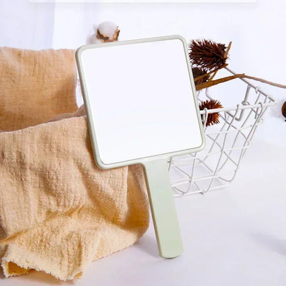 Espelho de Mão Quadrado para Maquiagem – Leve, Portátil e com Cabo Anatômico